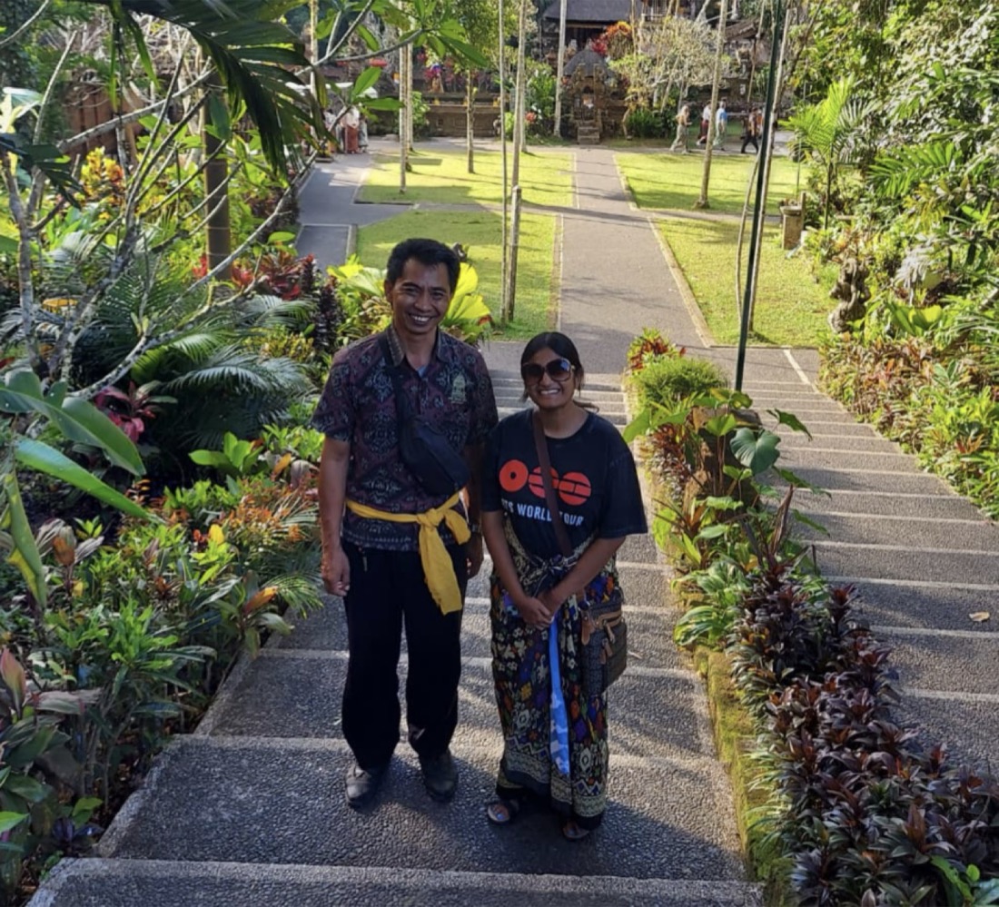 Arsa with a guest at a temple in Bali